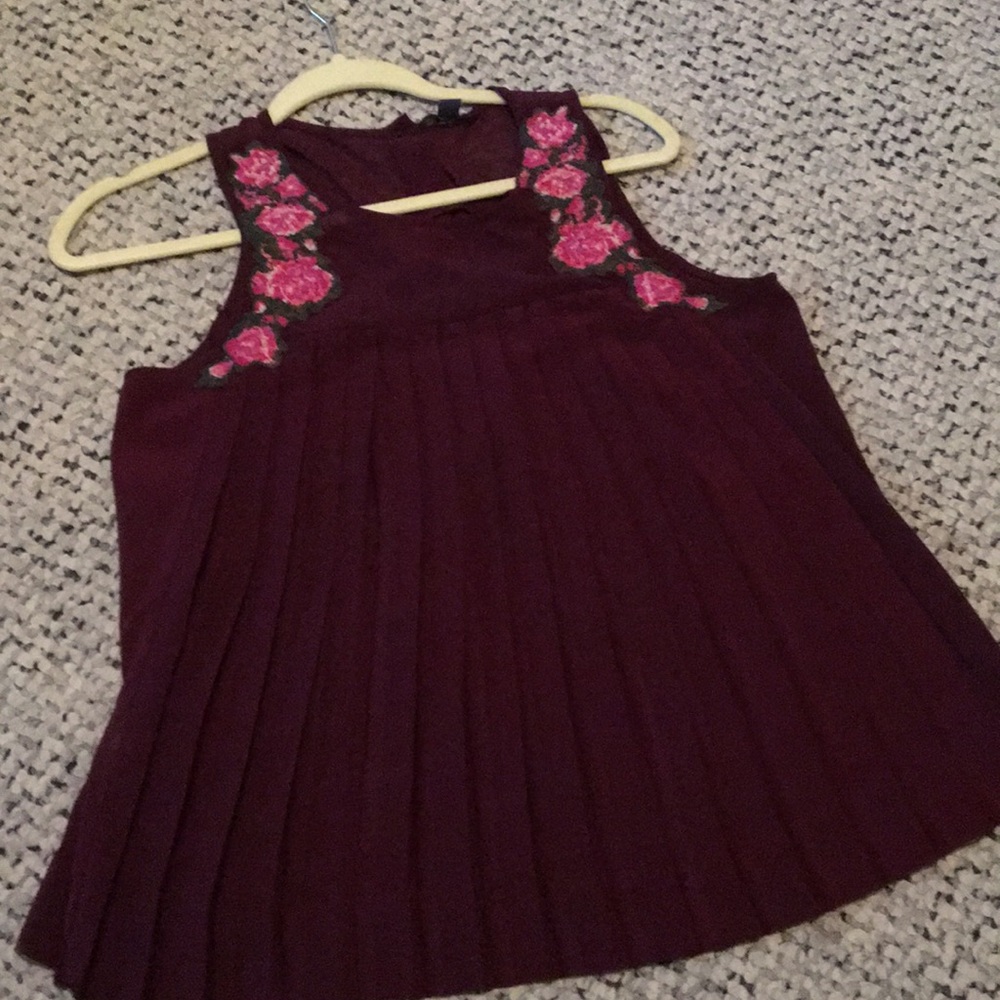A maroon floral tank top
